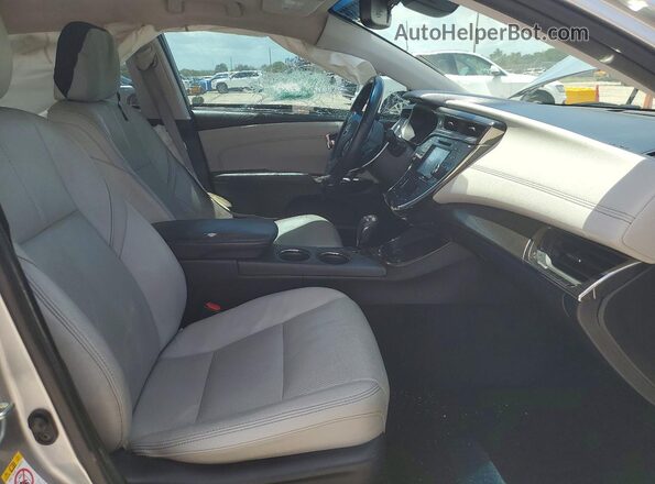 4T1BK1EB1HU252911 2017 TOYOTA AVALON Silver Widok wnętrza z przodu