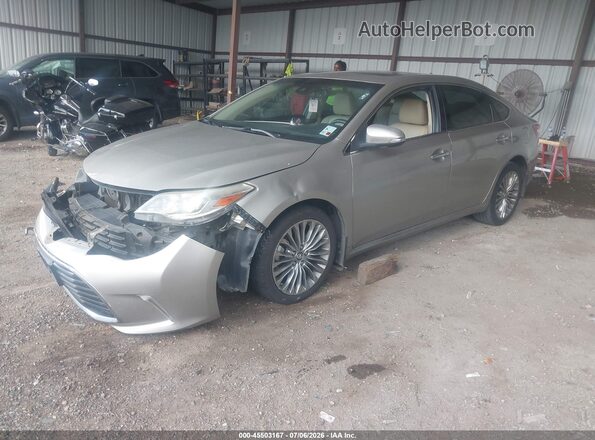 4T1BK1EB2GU231659 2016 TOYOTA AVALON Gold Przód lewy