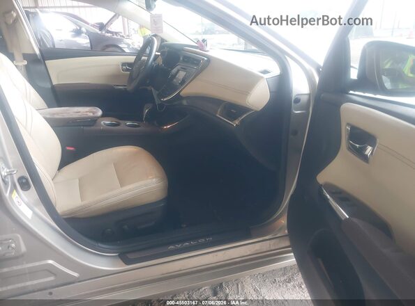 4T1BK1EB2GU231659 2016 TOYOTA AVALON Gold Widok wnętrza z przodu