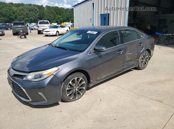 4T1BK1EB2JU281565 2018 TOYOTA AVALON Gray Vista de la etiqueta del VIN