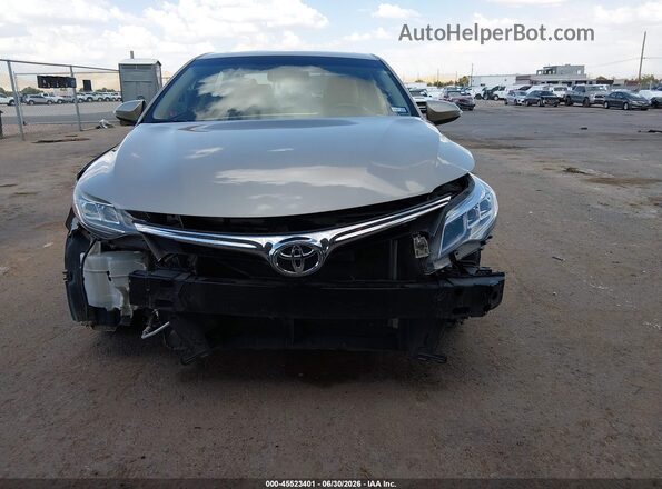 4T1BK1EB4GU225975 2016 TOYOTA AVALON Бежевый Вид задней части салона