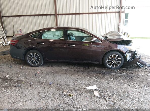 4T1BK1EB7GU216574 2016 TOYOTA AVALON Brown Rear interior view