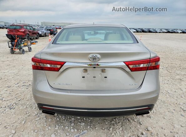 4T1BK1EB7GU217708 2016 TOYOTA AVALON Beige Vista trasera