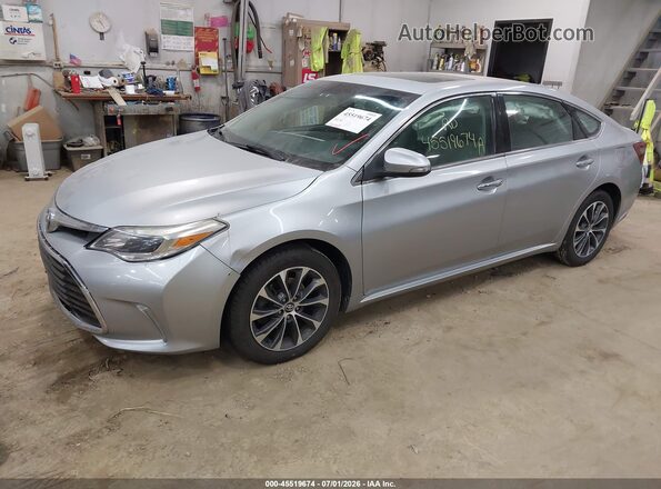 4T1BK1EB9GU239788 2016 TOYOTA AVALON Silver Vista tres cuartos delantera izquierda