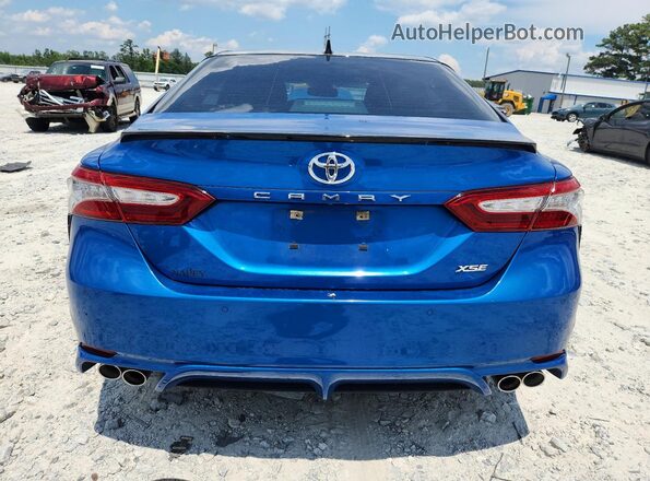 4T1BZ1HK0KU022792 2019 TOYOTA CAMRY Blue უკანა ხედი