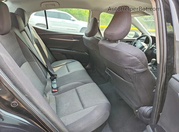 4T1DAACK0SU044685 2025 TOYOTA CAMRY Black Vista de los asientos traseros
