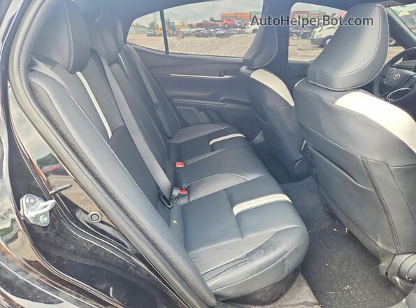 4T1DAACK0SU202331 2025 TOYOTA CAMRY Black Vista de los asientos traseros