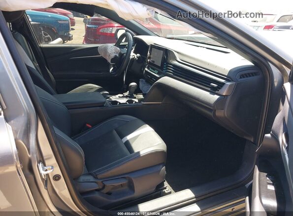 4T1DAACK0SU595750 2025 TOYOTA CAMRY Серый Вид салона спереди