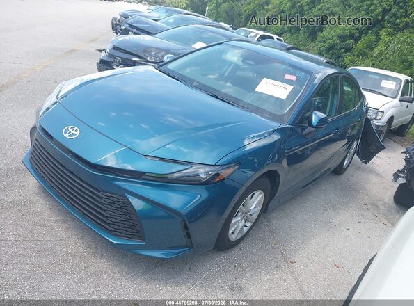 4T1DAACK0TU263082 2026 TOYOTA CAMRY Blue Vista tres cuartos delantera izquierda