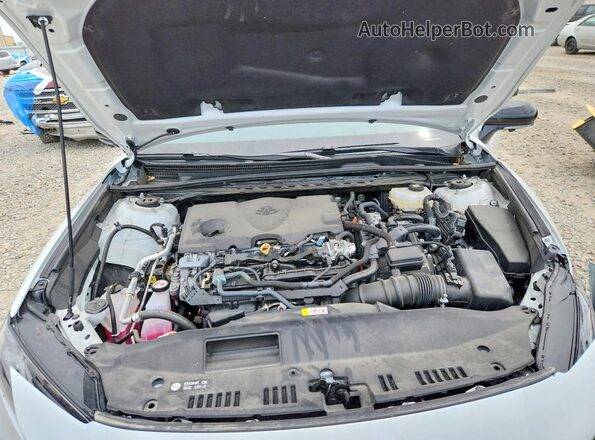 4T1DAACK1SU110533 2025 TOYOTA CAMRY White Rear interior view