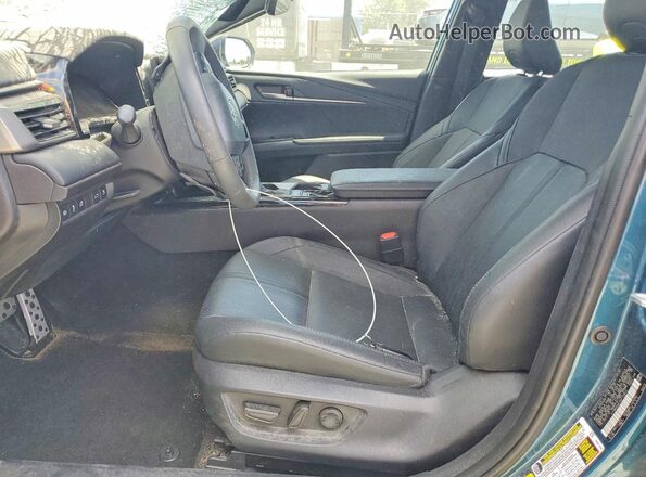 4T1DAACK1SU173843 2025 TOYOTA CAMRY Teal Вид салону спереду