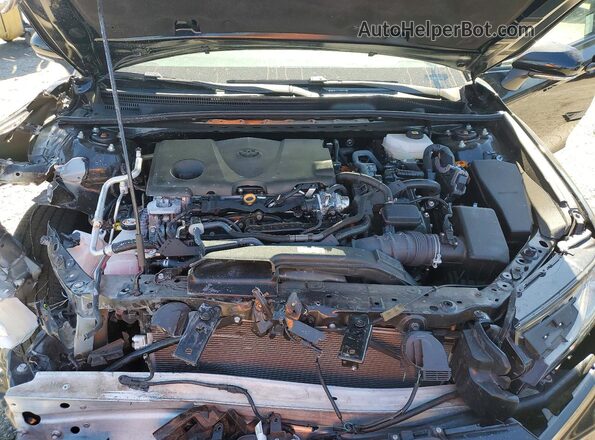 4T1DAACK1SU509992 2025 TOYOTA CAMRY Black Սալոնի հետևի տեսք