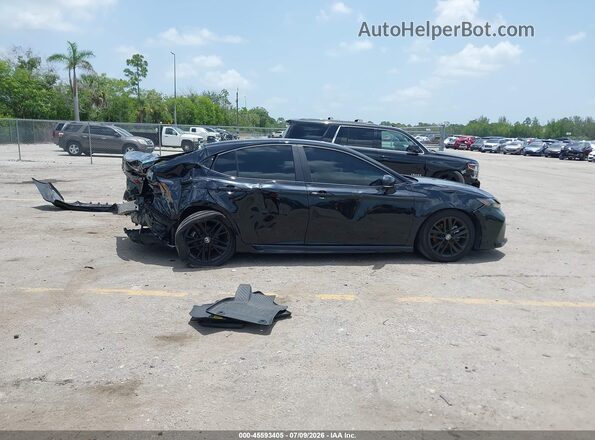 4T1DAACK1SU594459 2025 TOYOTA CAMRY Black Սալոնի հետևի տեսք