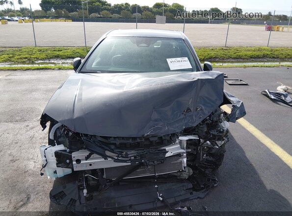 4T1DAACK1TU292056 2026 TOYOTA CAMRY Gray Widok wnętrza z tyłu