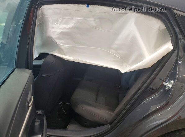 4T1DAACK2SU000929 2025 TOYOTA CAMRY Gray Rear seats view