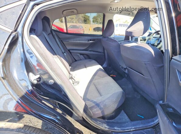4T1DAACK2SU533394 2025 TOYOTA CAMRY Black Rear seats view