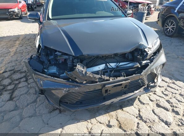 4T1DAACK3SU042106 2025 TOYOTA CAMRY Gray Widok z przodu