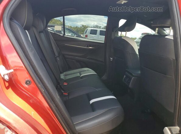 4T1DAACK3SU181099 2025 TOYOTA CAMRY Red Rear seats view