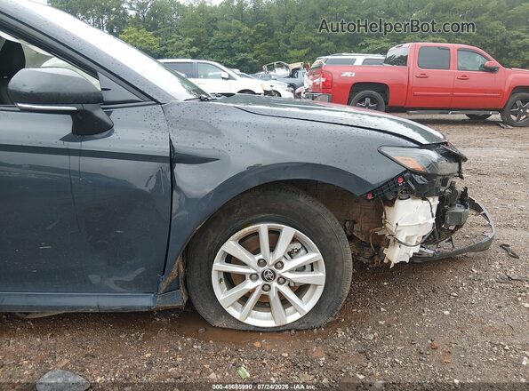 4T1DAACK3TU667672 2026 TOYOTA CAMRY Серый Вид спереди