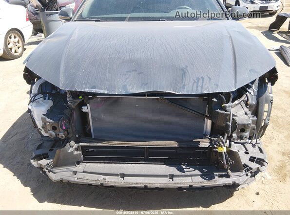 4T1DAACK4SU581964 2025 TOYOTA CAMRY Серый Вид спереди