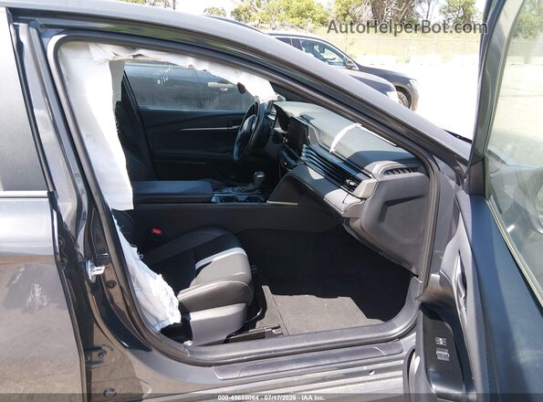 4T1DAACK5SU604460 2025 TOYOTA CAMRY Серый Вид салона спереди