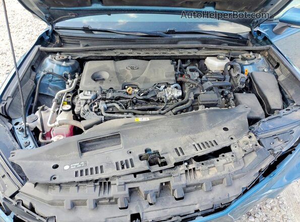 4T1DAACK6SU502293 2025 TOYOTA CAMRY Teal Rear interior view