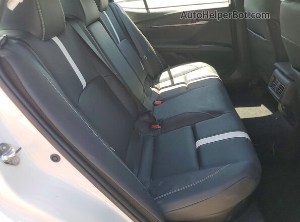 4T1DAACK6TU736970 2026 TOYOTA CAMRY White Vista de los asientos traseros