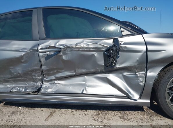 4T1DAACK7SU575141 2025 TOYOTA CAMRY Серый Вид спереди
