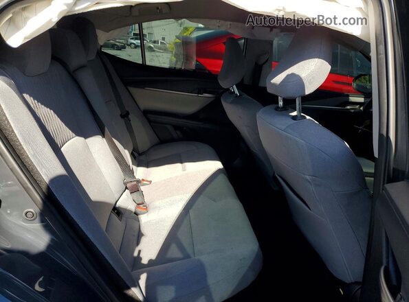 4T1DAACK7SU608896 2025 TOYOTA CAMRY Charcoal Widok tylnych siedzeń