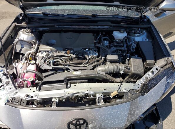 4T1DAACK7TU314299 2026 TOYOTA CAMRY Gray Vista interior trasera