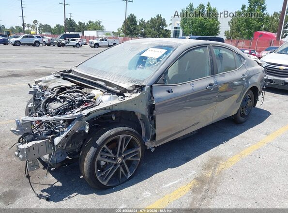 4T1DAACK7TU689383 2026 TOYOTA CAMRY Gray Vista tres cuartos delantera izquierda