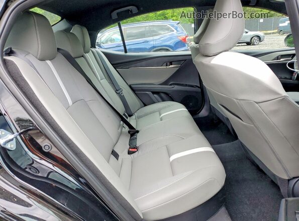 4T1DAACK8SU136417 2025 TOYOTA CAMRY Black Rear seats view