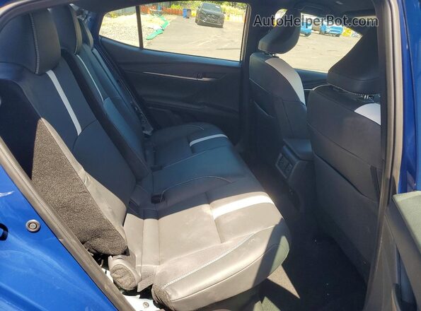4T1DAACK8SU175976 2025 TOYOTA CAMRY Blue Vista de los asientos traseros