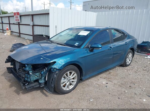 4T1DAACK8TU227205 2026 TOYOTA CAMRY Navy Vista tres cuartos delantera izquierda