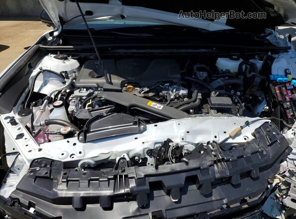 4T1DAACK9SU145983 2025 TOYOTA CAMRY White Widok wnętrza z tyłu