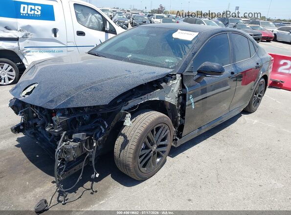 4T1DAACK9SU602534 2025 TOYOTA CAMRY Black Vista tres cuartos delantera izquierda
