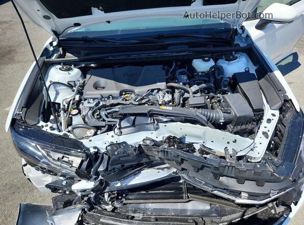 4T1DAACK9TU258706 2026 TOYOTA CAMRY White Rear interior view