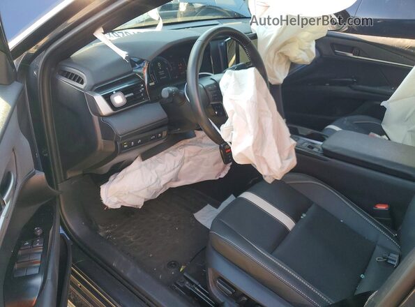 4T1DAACK9TU683911 2024 TOYOTA CAMRY Синий Вид панели приборов