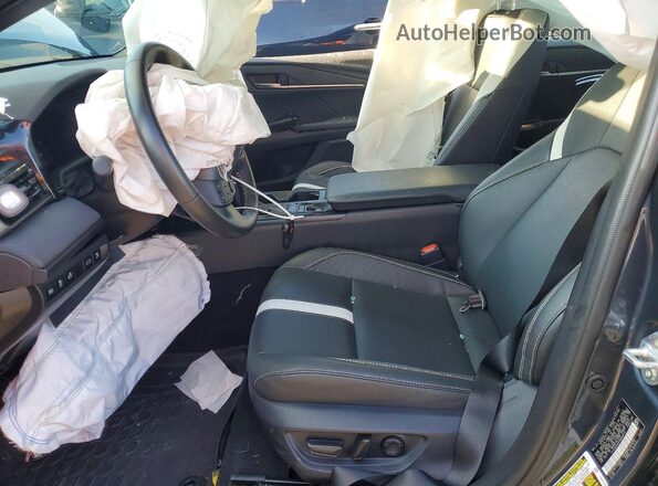 4T1DAACK9TU683911 2024 TOYOTA CAMRY Синий Вид салона спереди