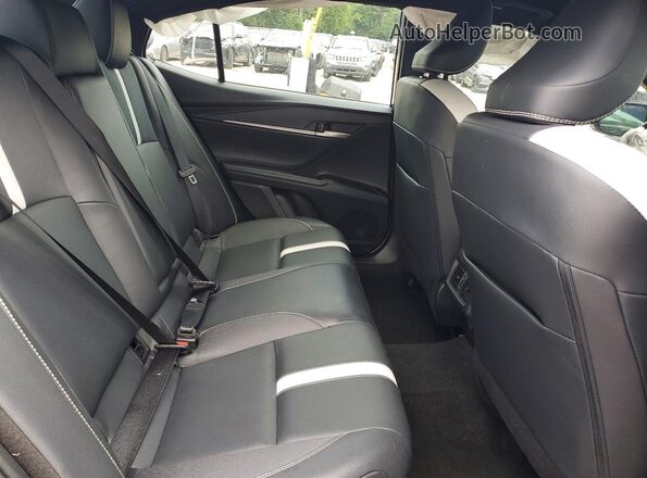 4T1DAACKXSU006347 2025 TOYOTA CAMRY Blue Vista de los asientos traseros