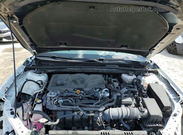 4T1DAACKXSU047061 2025 TOYOTA CAMRY White Rear interior view