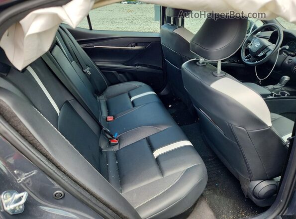 4T1DAACKXSU143191 2025 TOYOTA CAMRY Gray Vista de los asientos traseros