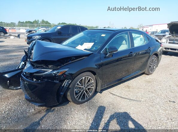 4T1DAACKXTU721548 2026 TOYOTA CAMRY Black Vista tres cuartos delantera izquierda