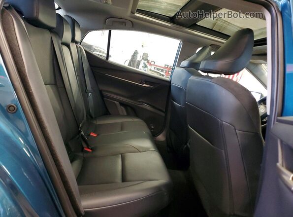 4T1DBADK2SU015541 2025 TOYOTA CAMRY Teal Vista de los asientos traseros