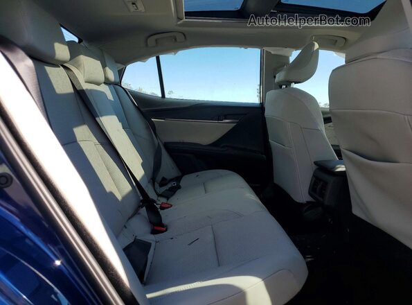 4T1DBADKXTU044027 2026 TOYOTA CAMRY Blue Rear seats view