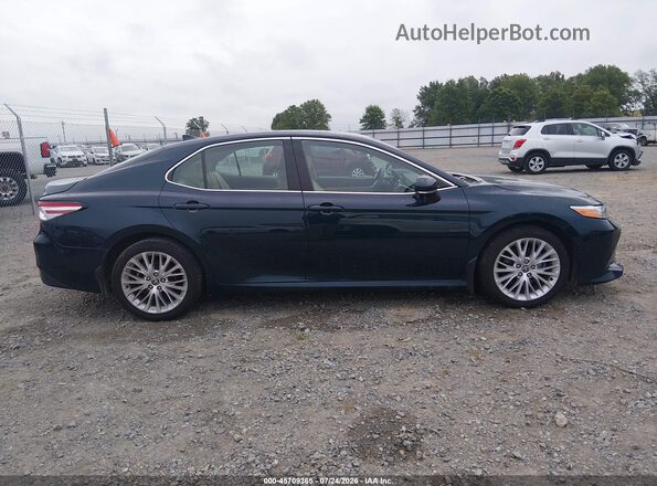 4T1F11AK6LU993946 2020 TOYOTA CAMRY Green Widok wnętrza z tyłu