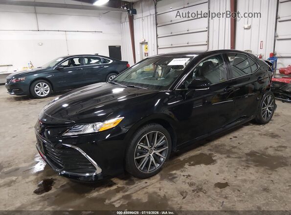 4T1F11BK4RU131669 2024 TOYOTA CAMRY Black წინა მარცხენა ხედი სამი მეოთხედიდან