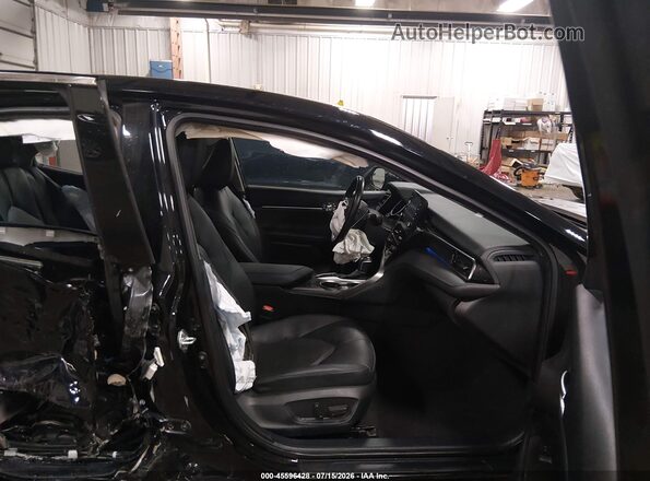 4T1F11BK4RU131669 2024 TOYOTA CAMRY Black წინა სალონის ხედი