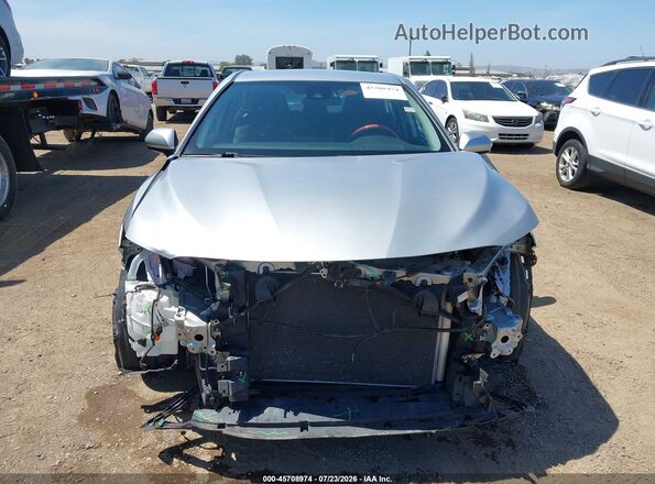 4T1G11AKXMU418237 2021 TOYOTA CAMRY Silver Vista interior trasera