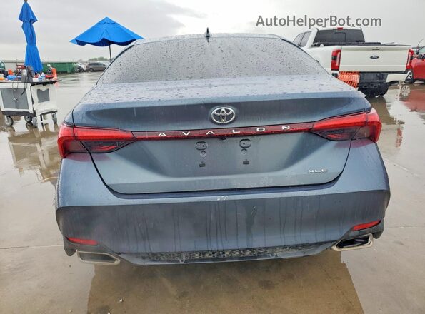 4T1JZ1FB2NU087095 2022 TOYOTA AVALON Blue Вид ззаду